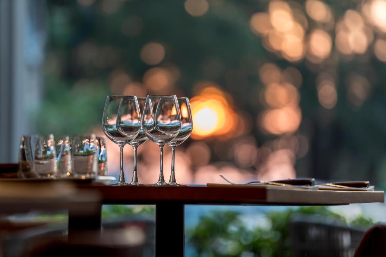 Outrigger Surin Beach Resort - Sha Extra Plus Eksteriør billede Wine glasses