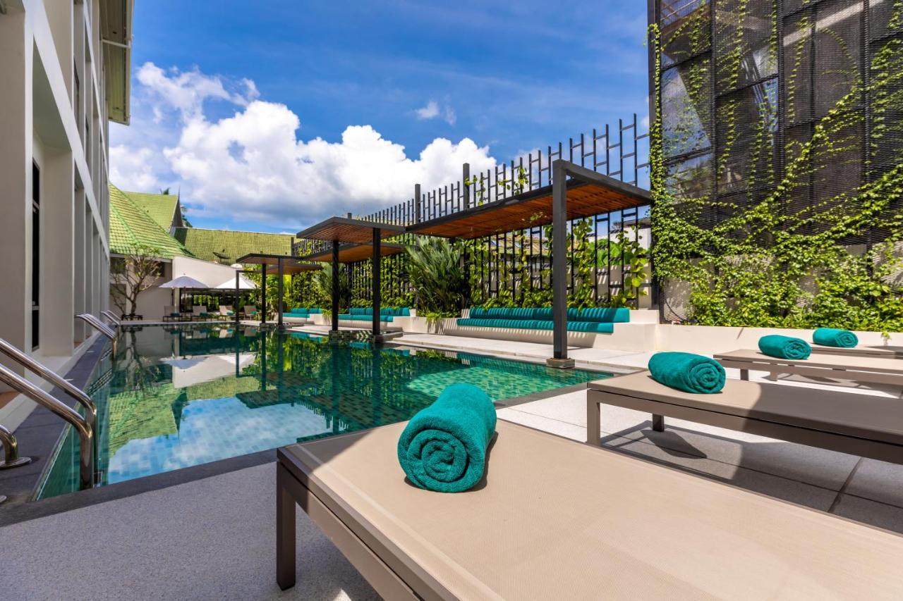 Outrigger Surin Beach Resort - Sha Extra Plus Eksteriør billede The swimming pool at the hotel